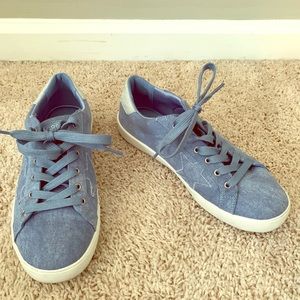 Blue sneakers with stars and fun accents